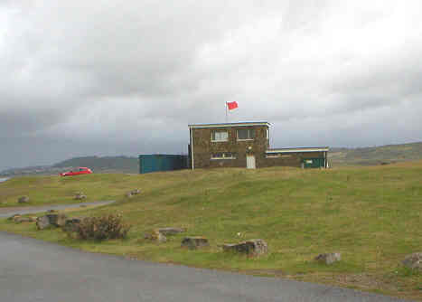 Lifeguard Station, Ogmore-by-Sea, with permanent red flag flying on river side