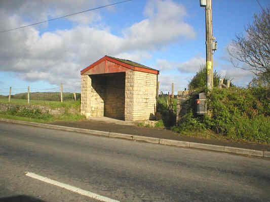 Bus stop and entrance to Merthyr Mawr coastal path to avoid stepping stones; this route includes steps to cross a concrete footbridge