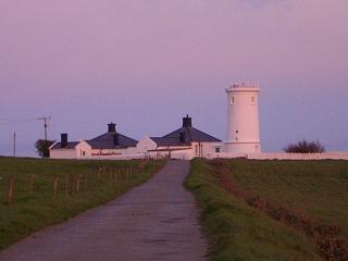 Lighthouse Tower which once housed the west or low light and  and cottages for the lighthouse keepers